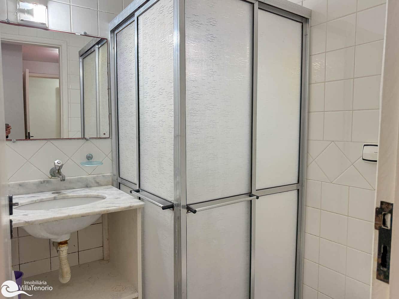 Banheiro da Suite_Apartamento a venda_Praia do Itagua_Ubtuba_2 quartos_ Apresentado pela Imobiliaria Villa Tenorio-23