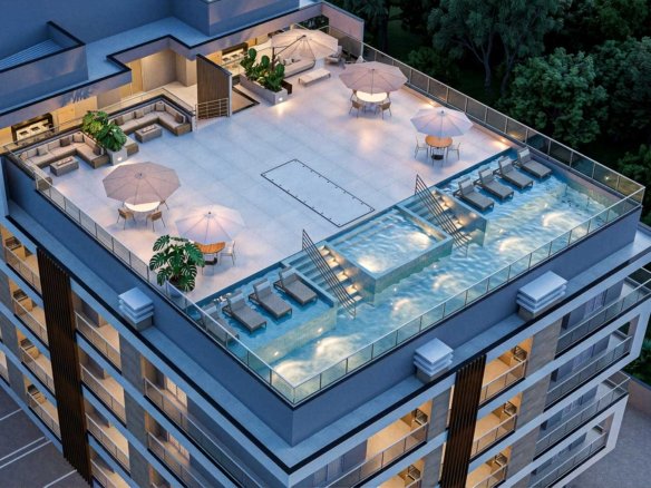 Fachada moderna do Residencial Kaá no Centro de Ubatuba, torre única com varandas integradas.